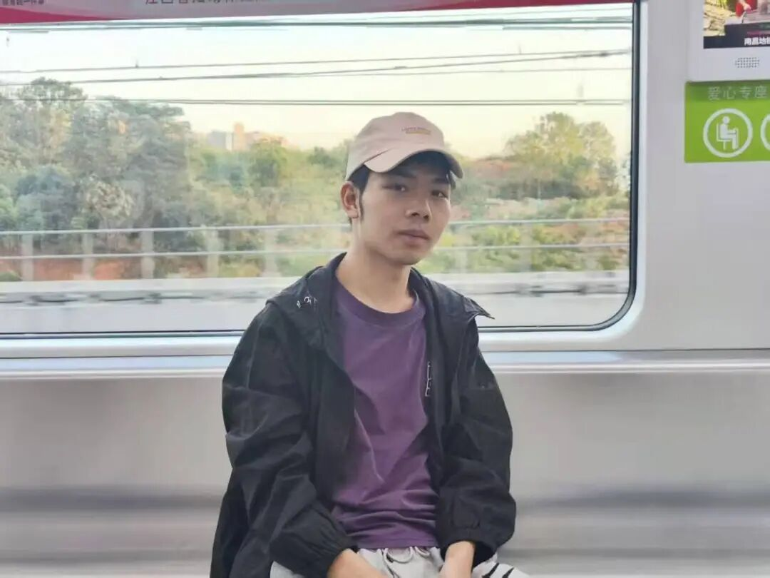 邹然良
